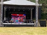 Outdoor stage with suspended LED screen, live broadcast of basketball matches